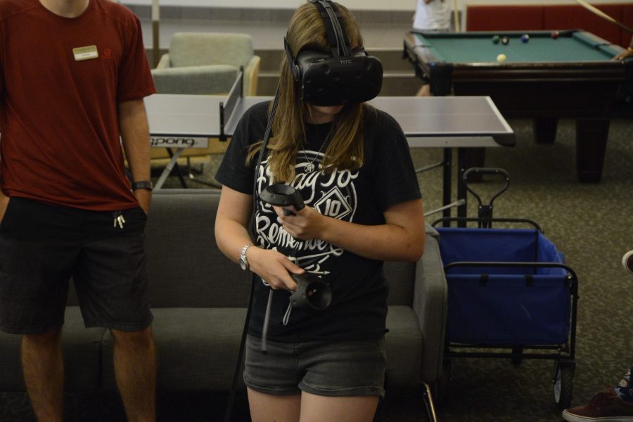 A CSU student uses the HTC VIVE during a virtual reality demonstration at Parmelee Hall.