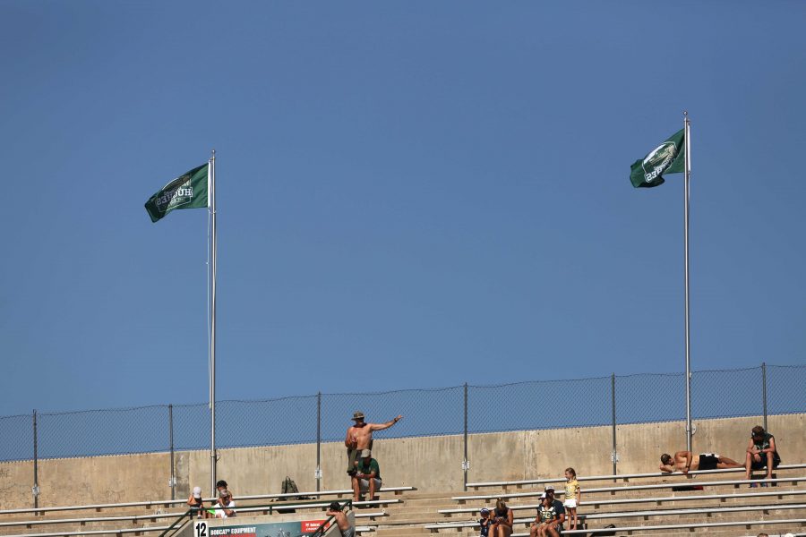 Fans soak up the sun and watch the football game against UTSA on Saturday afternoon at Hughes Stadium.