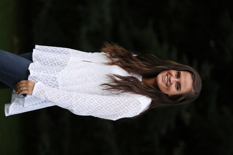 Colorado State University junior Kelly Davis poses for a portrait on Tuesday afternoon. Davis, who is the Vice President of Active Minds, an organization aimed at reducing mental health stigma among students, recently won a scholarship from the national Active Minds organization. (Forrest Czarnecki | Collegian)