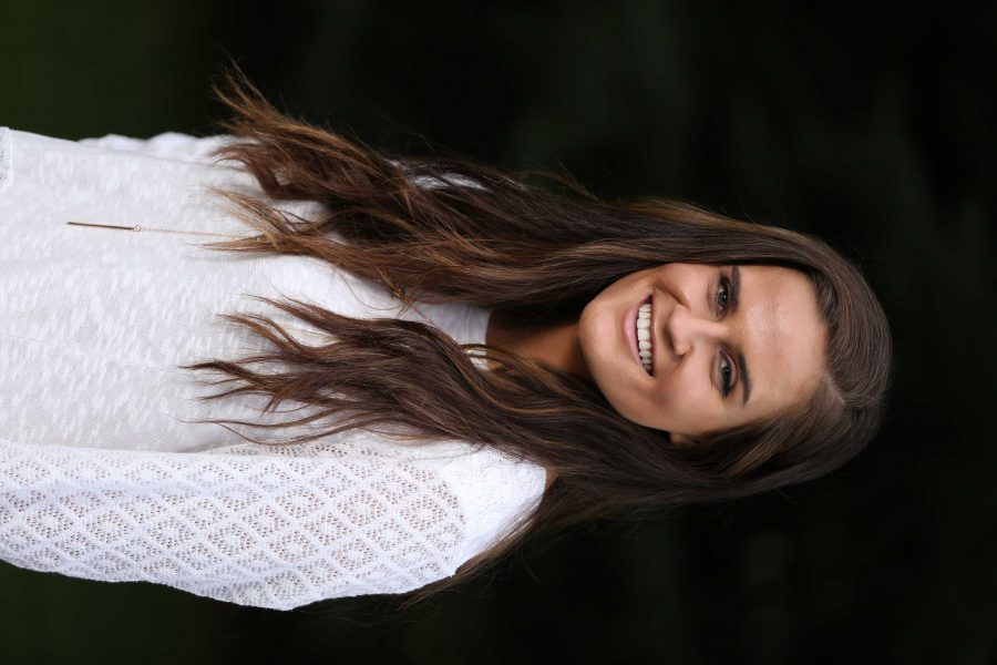 Colorado State University junior Kelly Davis poses for a portrait on Tuesday afternoon. Davis, who is the Vice President of Active Minds, an organization aimed at reducing mental health stigma among students, recently won a scholarship from the national Active Minds organization. (Forrest Czarnecki | Collegian)