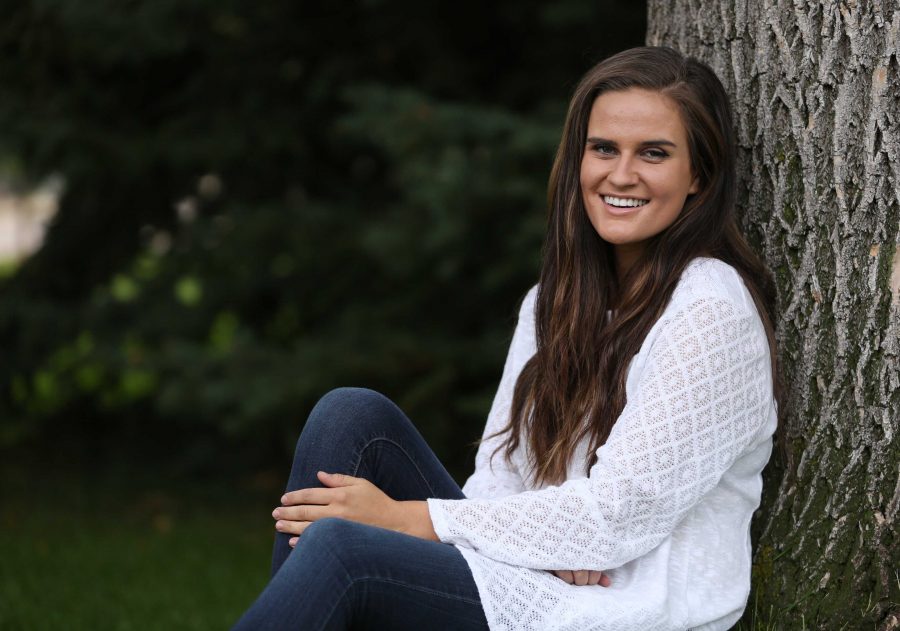 Colorado State University junior Kelly Davis poses for a portrait on Tuesday afternoon. Davis, who is the Vice President of Active Minds, an organization aimed at reducing mental health stigma among students, recently won a scholarship from the national Active Minds organization. (Forrest Czarnecki | Collegian)