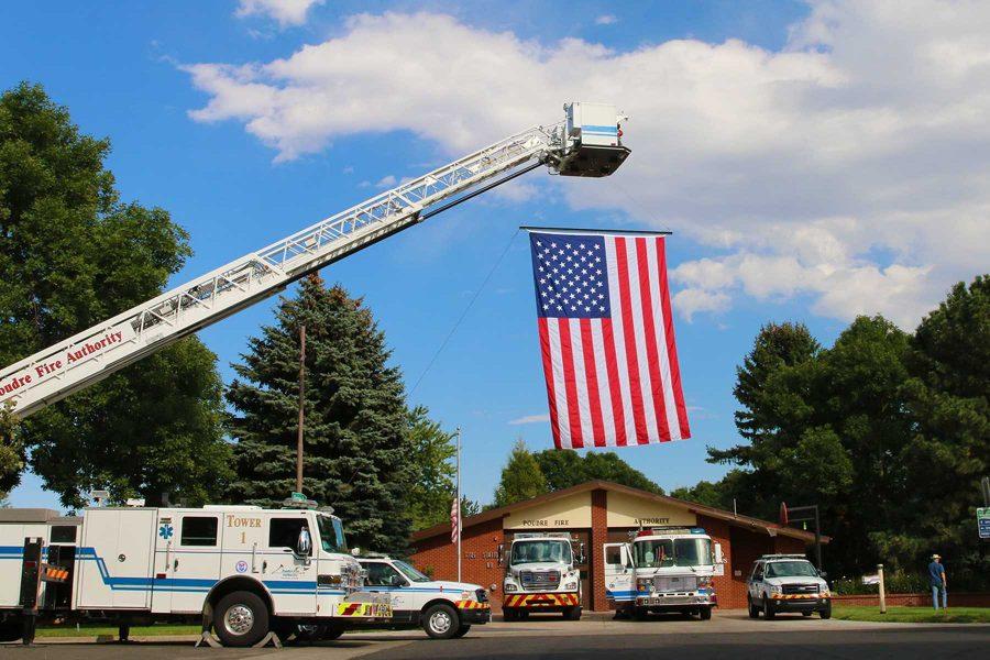 Poudre Fire Authoritys Tower 1 displays a Ceremonial American Flag at the 9/11 15th Anniversary Memorial Ceremony.