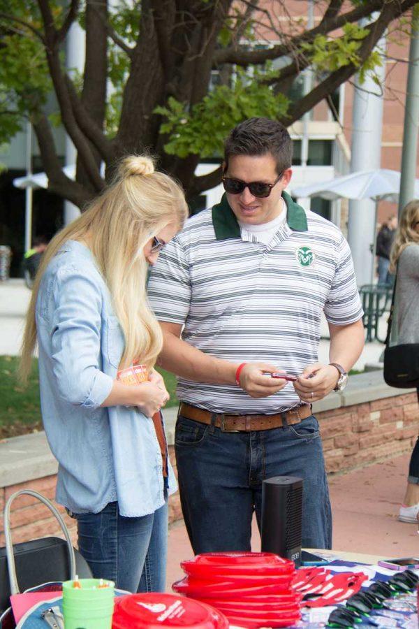 U.S. Congress candidate Nicholas Morse helps out with the CSU College Republican table on Sept. 14, 2016. (Tony Villalobos May| Collegian) Photo credit: Tony Villalobos May
