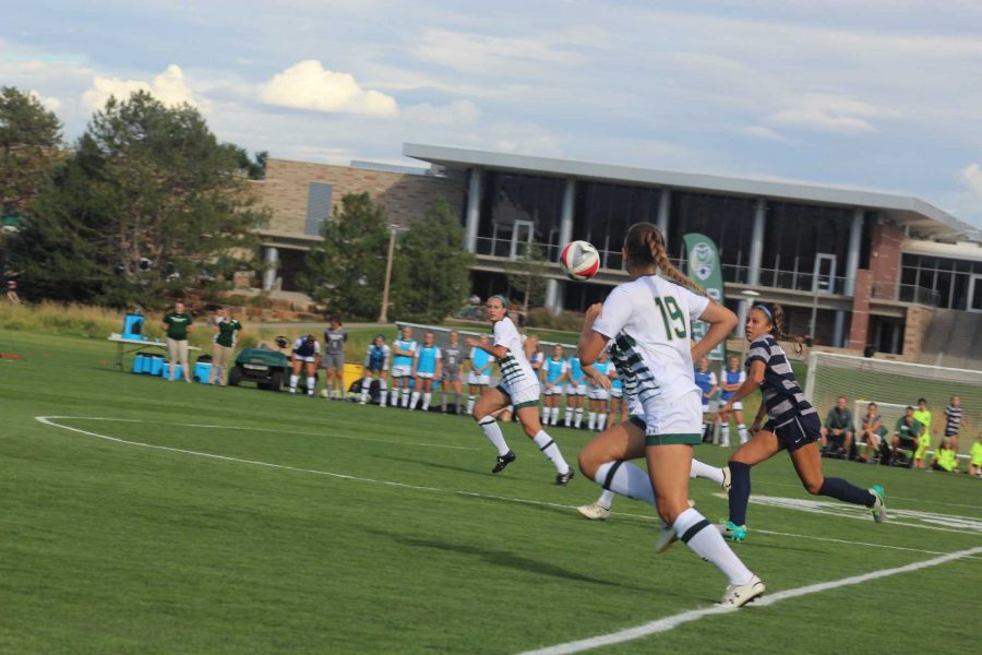 Kasey Dietrich passes to her teammate on an offensive drive against Nevada.