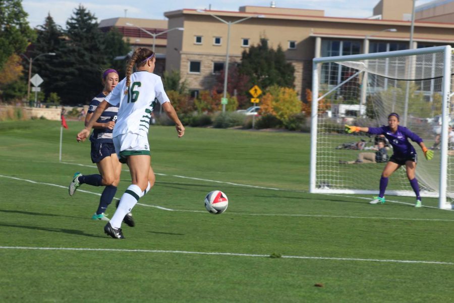Jessica Jochhelm (16) drives for the goal against Nevada
