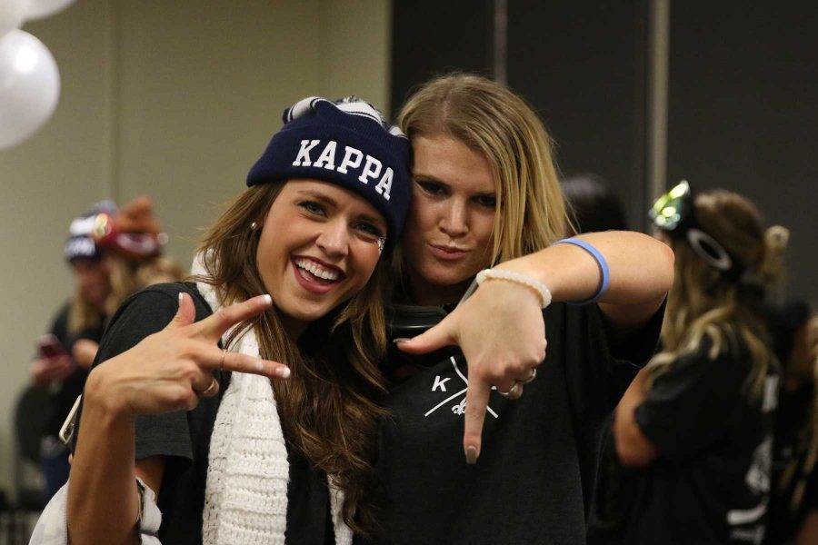 Kappa Kappa Gamma Members pose for a photo during the new member introduction party. (Elliott Jerge | Collegian)