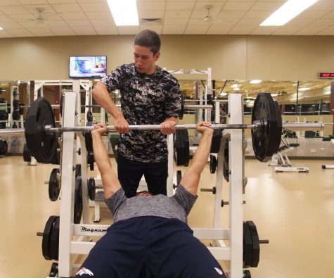 Whether its best friends or complete strangers, CSU students show Gym Etiquette for everyone around them. Photo credit: Christian Johnson