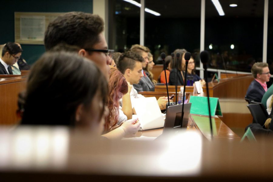 Members of the ASCSU Senate listen attentively to President Tony Frank (Kasen Schamaun | Collegian)