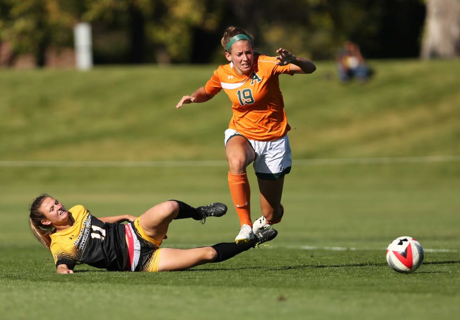 Colorado State University's Kasey Dietrich (19) fights to get past Colorado College's Madeline Stesney (11) during the first half of the game on Friday afternoon at the Lagoon Field. The Rams were beat by the Tigers 2-0. (Forrest Czarnecki | Collegian)