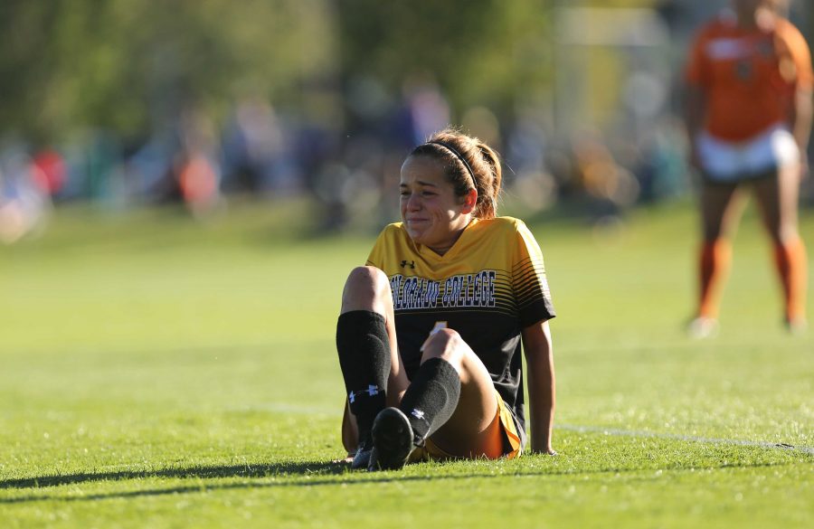 Colorado College's Anne-Sophie Lapointe (4) reacts after being injured during the second half of the game on Friday afternoon at the Lagoon Field. The Rams were beat by the Tigers 2-0. (Forrest Czarnecki | Collegian)