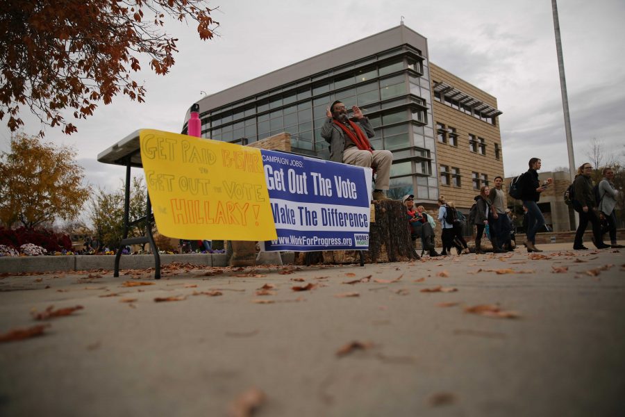 Jed Smock, on stump, preaches to students and speaks out about social and political issues in the Plaza on Tuesday afternoon. Some students became engaged and argued back at forth with Smock on viewpoints surrounding the election, race, abortion, and religion. (Forrest Czarnecki | Collegian)