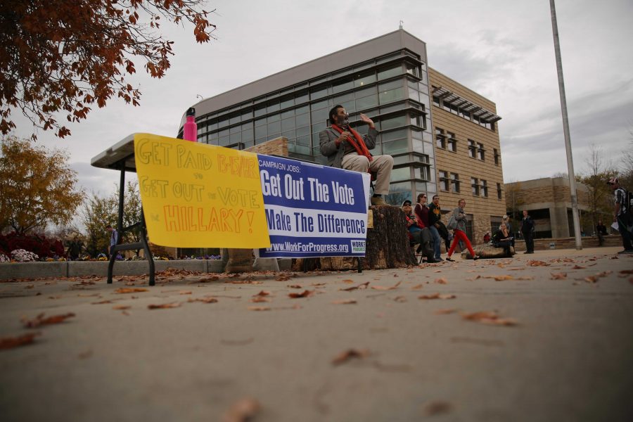 Jed Smock, on stump, preaches to students and speaks out about social and political issues in the Plaza on Tuesday afternoon. Some students became engaged and argued back at forth with Smock on viewpoints surrounding the election, race, abortion, and religion. (Forrest Czarnecki | Collegian)