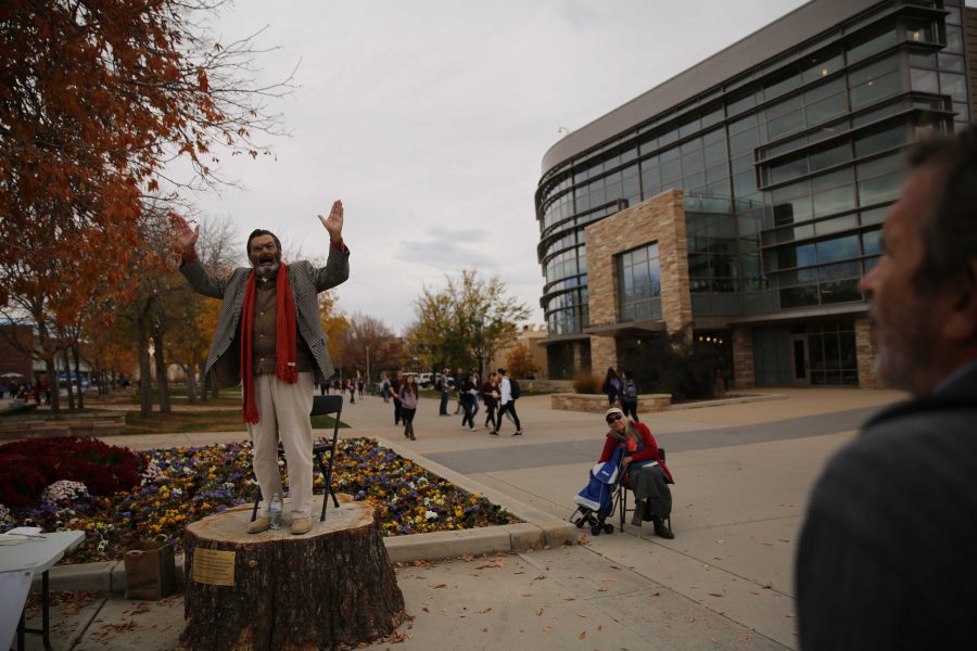 Jed Smock, on stump, preaches to students and speaks out about social and political issues in the Plaza on Tuesday afternoon. Some students became engaged and argued back at forth with Smock on viewpoints surrounding the election, race, abortion, and religion. (Forrest Czarnecki | Collegian)