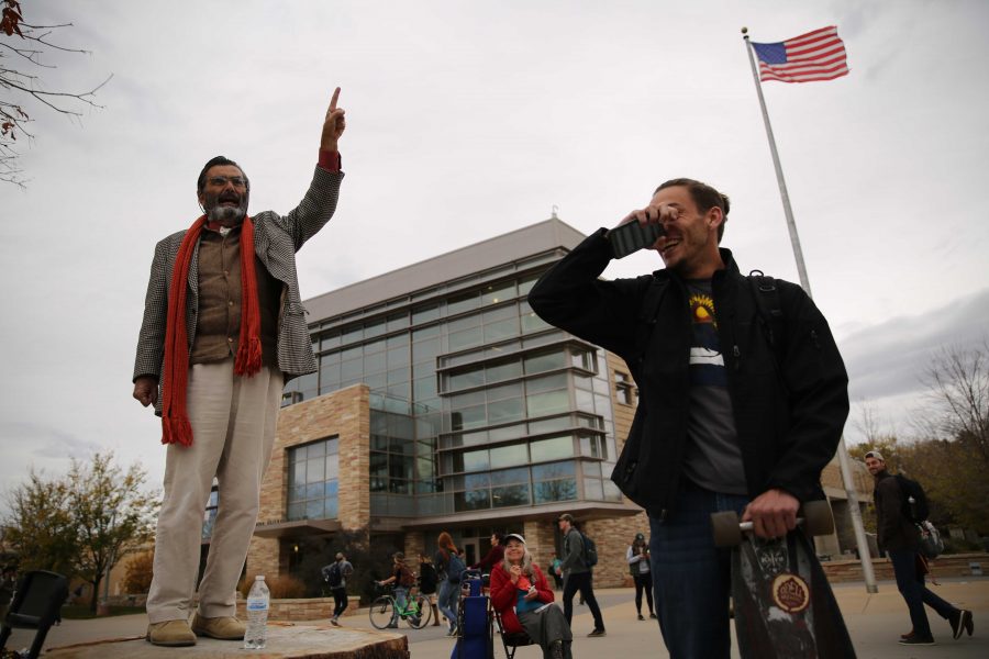 Colorado State University student Heath Elliott, right, and Jed Smock, left, get into an animated argument about this year's presidential nominees while in the Plaza on Tuesday afternoon. Elliott and Smock argued back at forth on viewpoints surrounding the election, race, sexuality, and religion. (Forrest Czarnecki | Collegian)