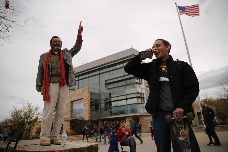Colorado State University student Heath Elliott, right, and Jed Smock, left, get into an animated argument about this year's presidential nominees while in the Plaza on Tuesday afternoon. Elliott and Smock argued back at forth on viewpoints surrounding the election, race, sexuality, and religion. (Forrest Czarnecki | Collegian)