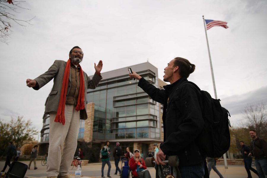 Colorado State University student Heath Elliott, right, and Jed Smock, left, get into an animated argument about this year's presidential nominees while in the Plaza on Tuesday afternoon. Elliott and Smock argued back at forth on viewpoints surrounding the election, race, sexuality, and religion. (Forrest Czarnecki | Collegian)