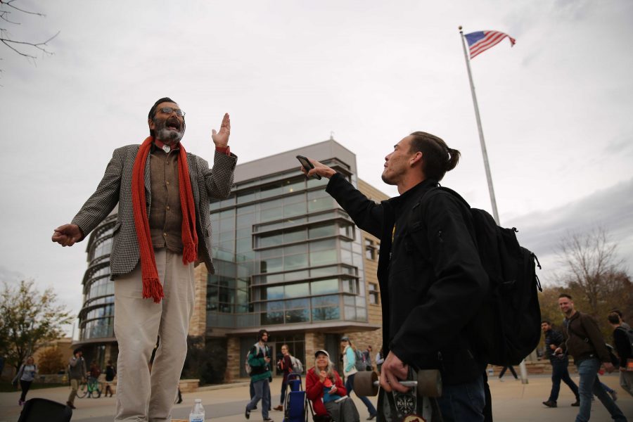 Colorado State University student Heath Elliott, right, and Jed Smock, left, get into an animated argument about this year's presidential nominees while in the Plaza on Tuesday afternoon. Elliott and Smock argued back at forth on viewpoints surrounding the election, race, sexuality, and religion. (Forrest Czarnecki | Collegian)