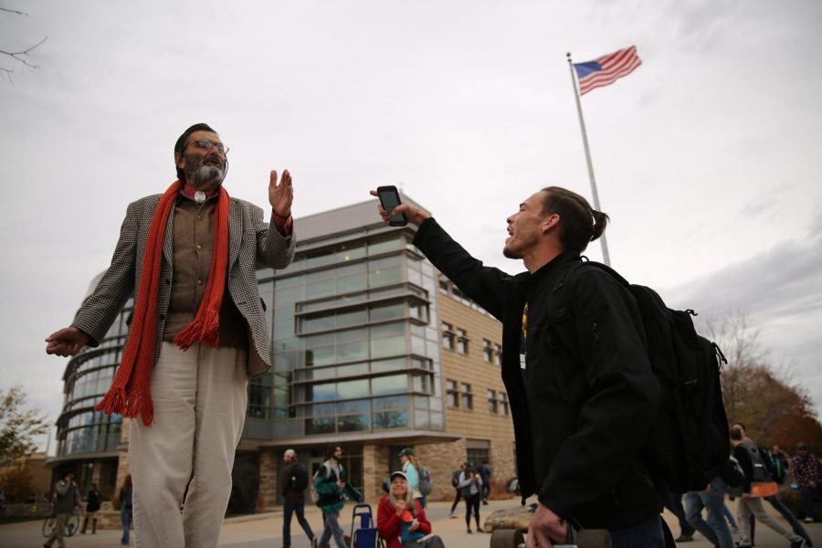 Colorado State University student Heath Elliott, right, and Jed Smock, left, get into an animated argument about this years presidential nominees while in the Plaza on Tuesday afternoon. Elliott and Smock argued back at forth on viewpoints surrounding the election, race, sexuality, and religion. (Forrest Czarnecki | Collegian)