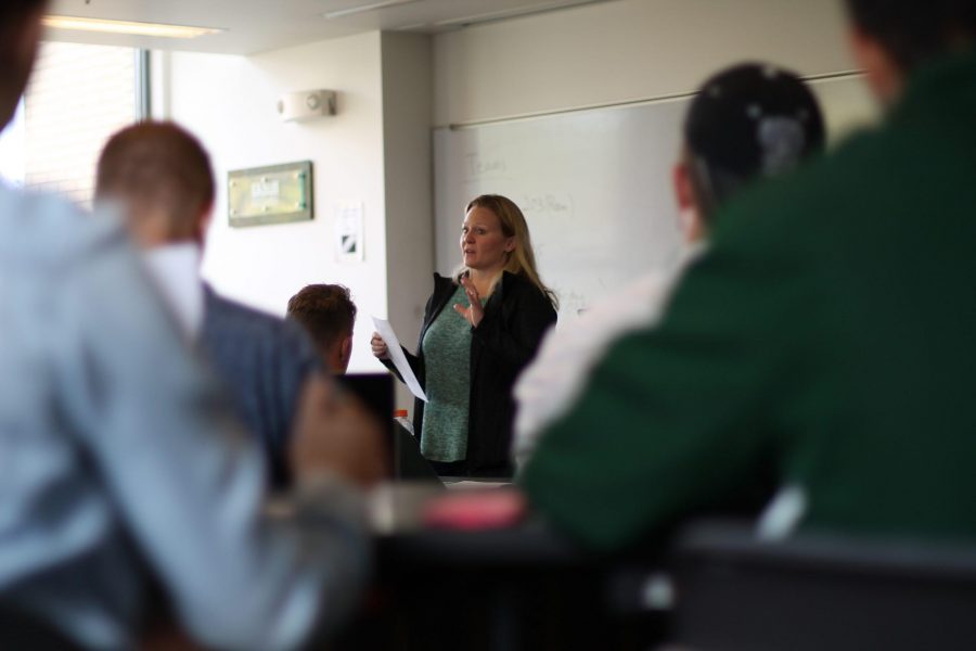 Jenny Morse, a PhD adjunct professor, explains an assignment to one of her classes. Photo credit: Natalie Dyer