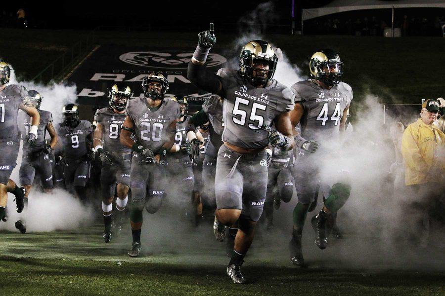Colorado State players run out of the tunnel prior to the Border Wars game against the Wyoming Cowboys. (Elliott Jerge | Collegian)