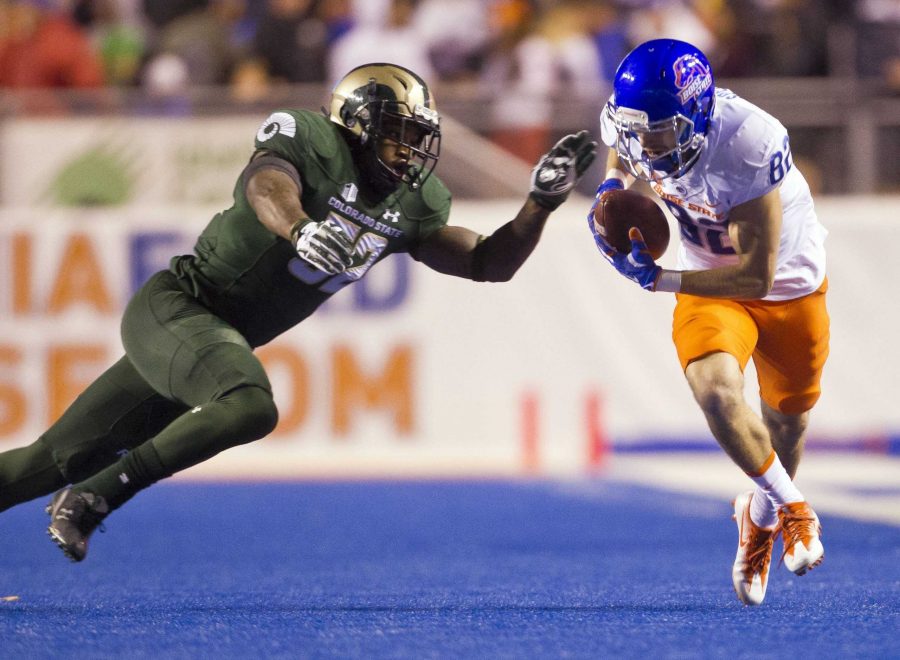 Boise State wide receiver Thomas Sperbeck (82) catches a long pass while defended by Colorado State linebacker Tre Thomas (52) in the first quarter on Saturday, Oct. 15, 2016, at Albertsons Stadium in Boise, Id. (Darin Oswald/Idaho Statesman/TNS)