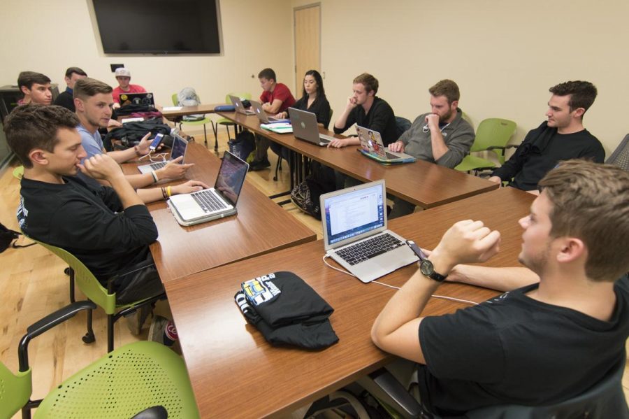 Members of the CSU Vegan Club discuss upcoming opportunities at a meeting in the LSC on Thursday night. (Michael Berg | Collegian)   