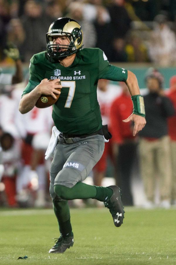 Colorado State University quarterback Nick Stevens (7) runs the ball up the field against New Mexico at Hughes Stadium on Nov 19. This is the final game at Hughes  Stadium before moving to an on campus stadium in 2017. (Luke Walker | Collegian)