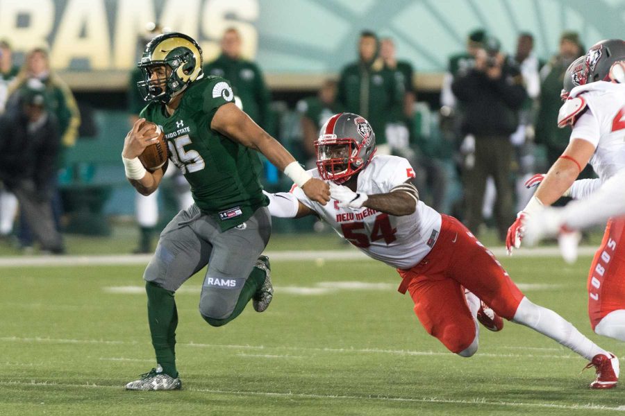Colorado State running back Izzy Mathews (35) breaks a tackle for a first down against New Mexico at Sonny Lubick Field at Hughes Stadium on Nov 19. This was the final game at Hughes Stadium. (Luke Walker | Collegian)