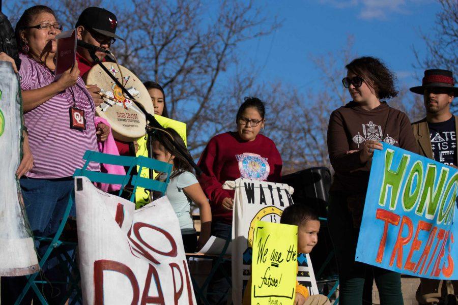 A Navajo Native, Jan Iron, speaks at the Standing Rock Rally with the support of her family (Julia Trowbridge | Collegian)