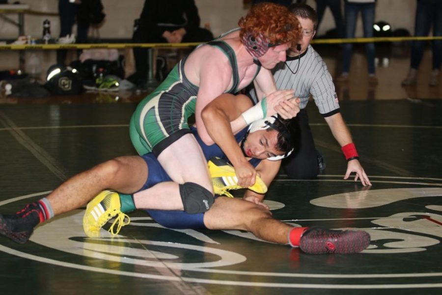 Senior Mike Brungardt wrestles an oppont last season. Brugardt is looking for his third trip to nationals