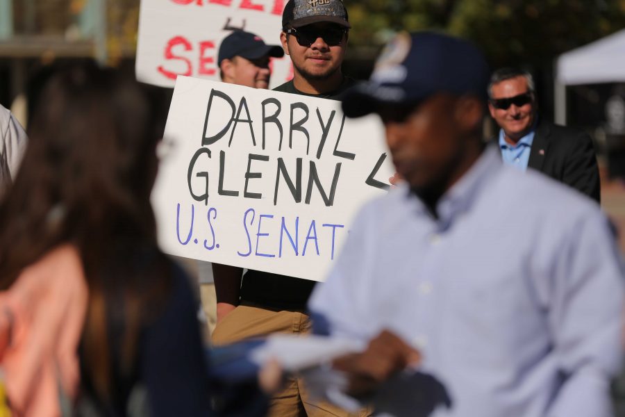 Supporters of Republican candidate for the U.S. Senate Darryl Glenn hold signs for Glenn during a rally in the Plaza on Friday, November 4th. (Forrest Czarnecki | Collegian)