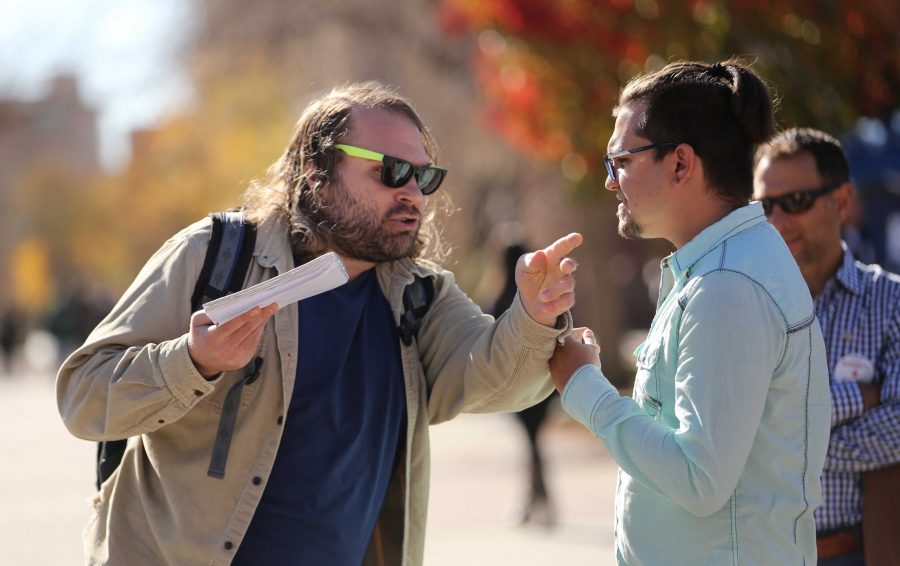Joe Sancaniello, right, confronts a protestor during a rally for Republican candidate for the U.S. Senate, Darryl Glenn, in the Plaza on Friday, November 4th. (Forrest Czarnecki | Collegian)