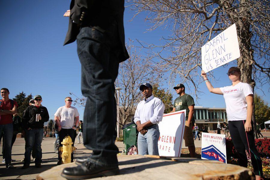Republican candidate for the U.S. Senate, Darryl Glenn (in blue shirt with hat), waits to be introduced before speaking in the Plaza on Friday, November 4th. (Forrest Czarnecki | Collegian)