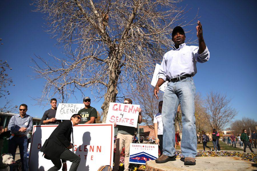 Republican candidate for the U.S. Senate, Darryl Glenn (in blue shirt with hat), speaks in the Plaza on Friday, November 4th. (Forrest Czarnecki | Collegian)