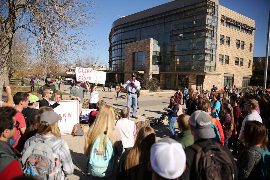 Republican candidate for the U.S. Senate, Darryl Glenn (in blue shirt with hat), speaks in the Plaza on Friday, November 4th. (Forrest Czarnecki | Collegian)