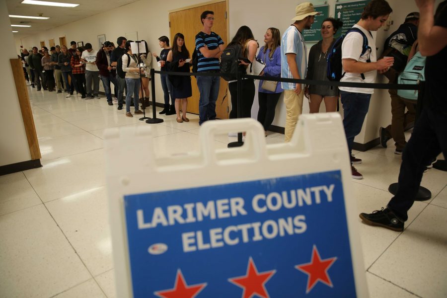 Colorado State University students and Larimer county citizens wait in line to vote in persons and drop off their ballots at the Lory Student Center on Tuesday, November 8th. (Forrest Czarnecki | Collegian)