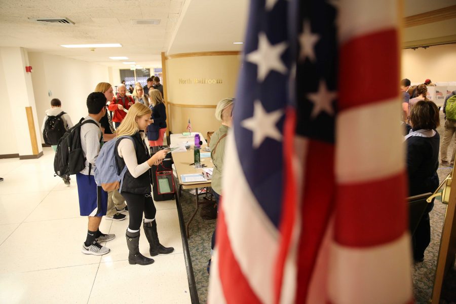 Colorado State University students and Larimer county citizens wait in line to vote in persons and drop off their ballots at the Lory Student Center on Tuesday, November 8th. (Forrest Czarnecki | Collegian)
