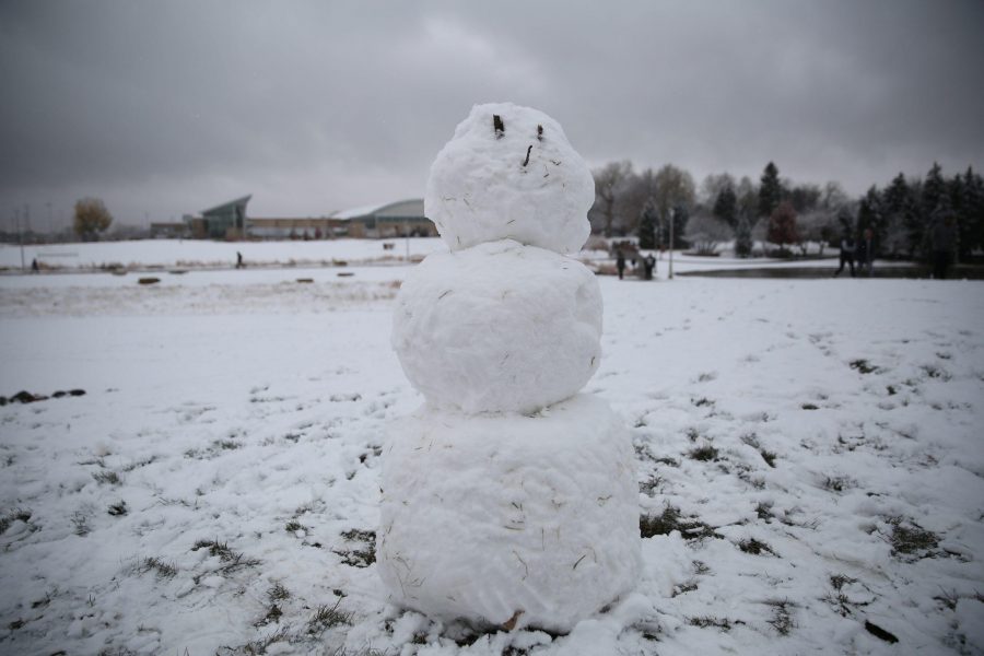 A snowman stands by the Lory Student Center on Thursday afternoon. Several inches of snow fell on Thursday afternoon, and temperatures are predicted to stay in the low 40s for Friday. (Forrest Czarnecki | Collegian)