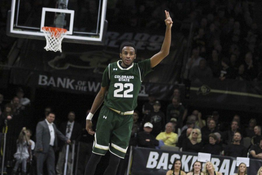 J.D. Paige (22) holds up three fingers after hitting a dagger three pointer late in the 2nd half of the Rams 72-58 win over rival CU. (Javon Harris | Collegian)