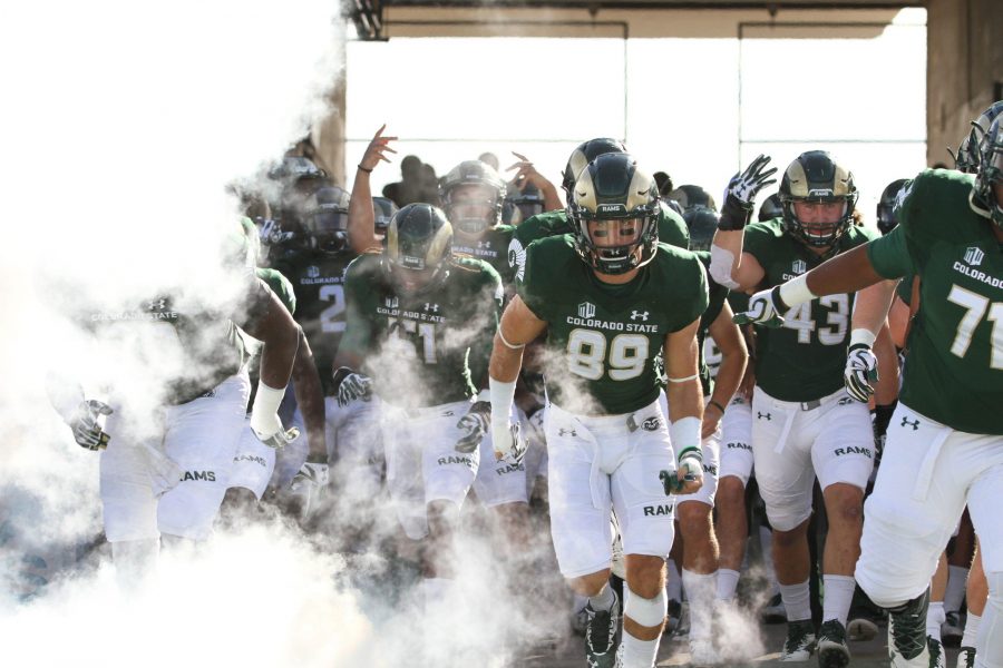 Robert Ruiz (89) and other CSU football players before the start of their game against Fresno State. (Javon Harris | Collegian)
