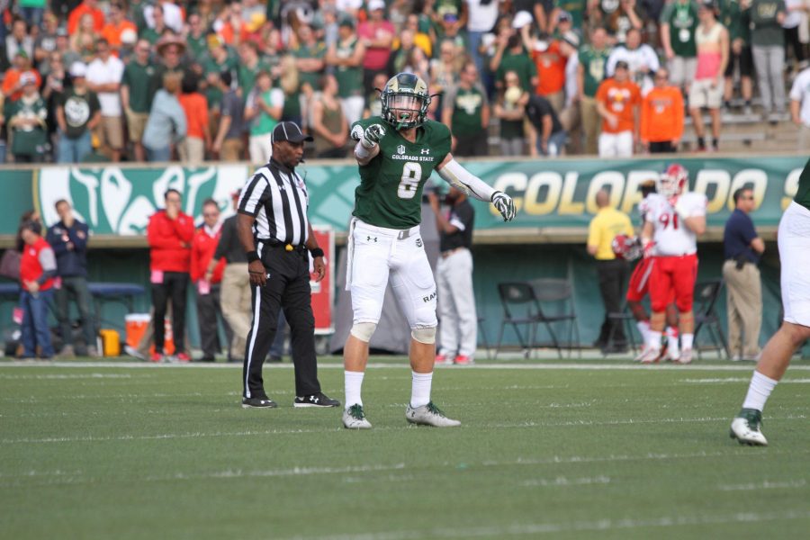 CSU safety Jake Schlager (8) calls the defense during the Rams win against Fresno State. (Javon Harris | Collegian)
