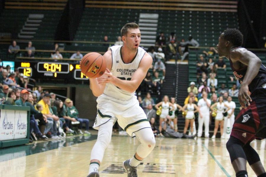 Braden Koelliker (33) looks to pass during the Rams 64-61 win over New Mexico State. (Javon Harris | Collegian)