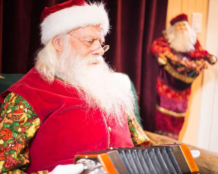 During December, Old Town Fort Collins is home to a Santa Clause who is trilangual. His languages include English, Spanish, Portuguese, and he is working on French.  (Ryan Arb | Collegian)