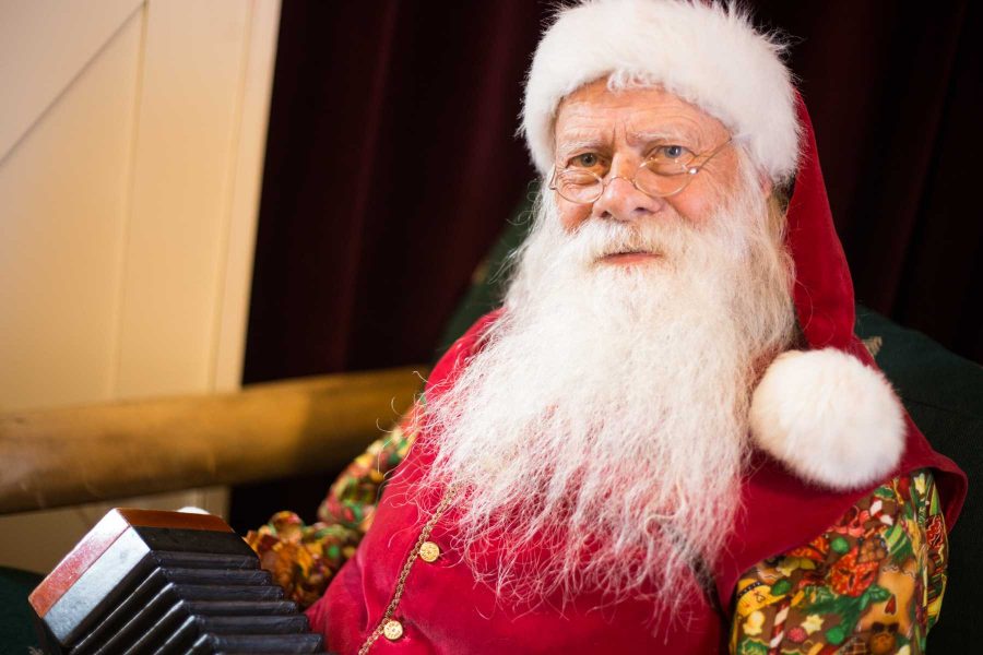 During December, Old Town Fort Collins is home to a Santa Clause who is trilingual. His languages include English, Spanish, Portuguese, and he is working on French. Photo credit: Ryan Arb