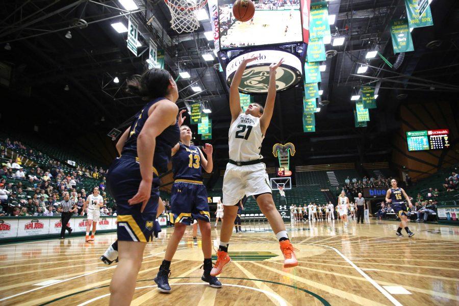 Colorado State University's Myanne Hamm (21) goes for a layup shot during the second half of the game on Sunday afternoon against the University of Northern Colorado. The Rams beat the visiting Bears 58-47. (Forrest Czarnecki | Collegian)