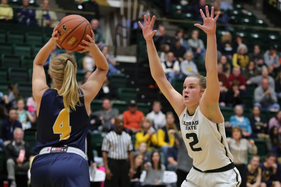 Colorado State University's Stine Austgulen (2) defends against a University of Northern Colorado player during the second half of the game on Sunday afternoon against the University of Northern Colorado. The Rams beat the visiting Bears 58-47. (Forrest Czarnecki | Collegian)