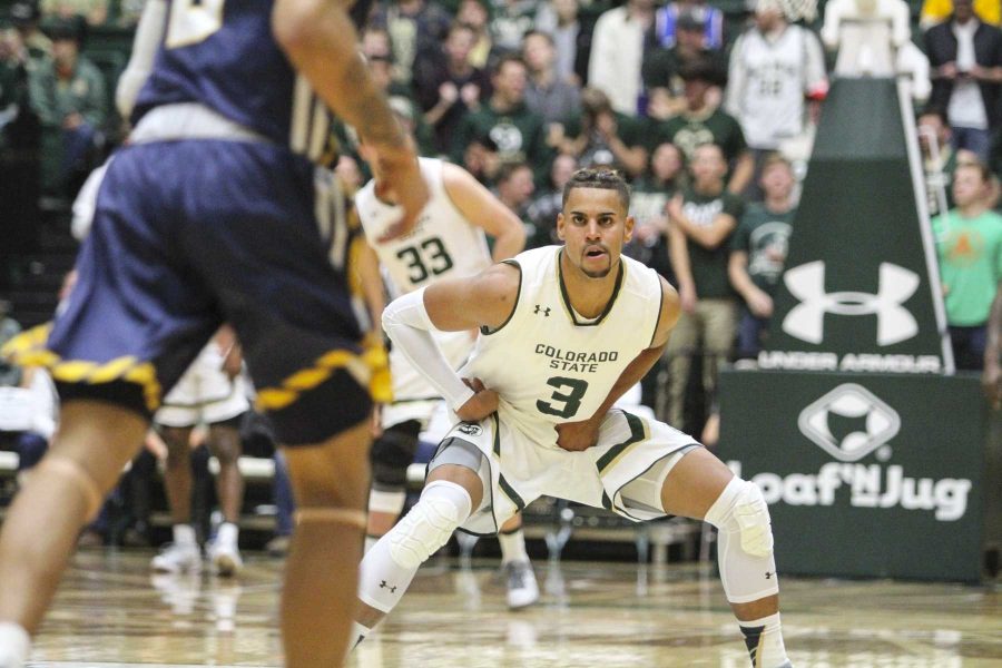 Gian Clavell (3) gets into a defensive stance in the 2nd half of the Rams win over UNC. Clavell returned to the court after a 9 game suspension from the team. Clavell came off the bench against Northern Colorado but finished the game with 15 points. (Javon Harris | Collegian)