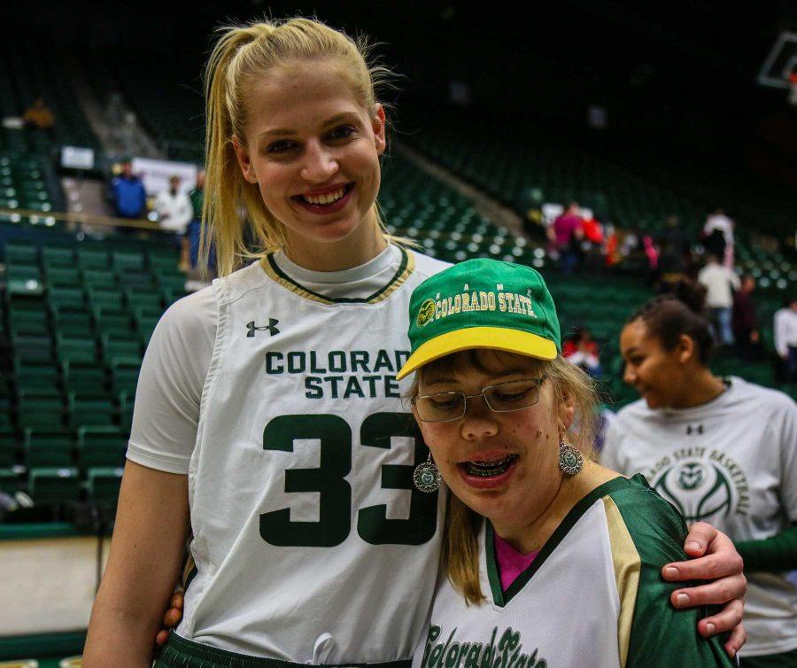 CSU Freshman Anna Dreimane signs posters with fans after the game on January 18, 2017 (Davis Bonner | Collegian)