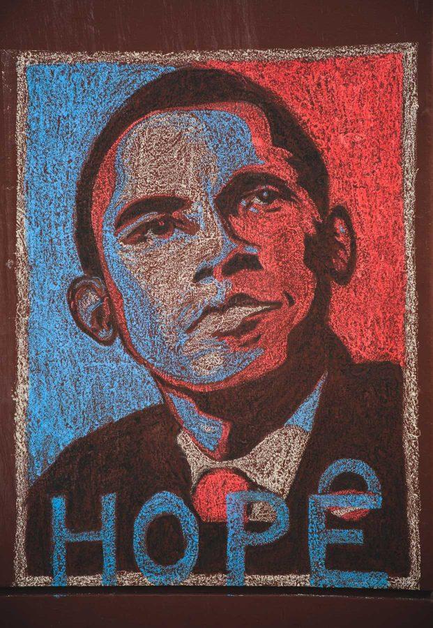 A chalk mural decorates the side of Clark A on the morning of Trump's Inauguration. (Davis Bonner | Collegian)