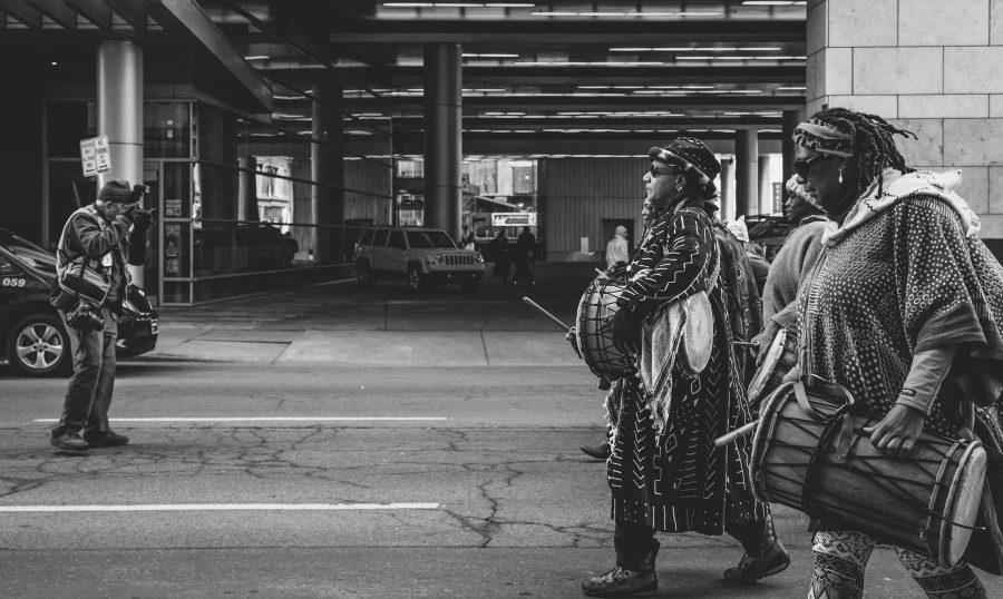 A photojournalist captures the front of the parade during the Women's March in Denver, January 21, 2017 (Davis Bonner | Collegian)